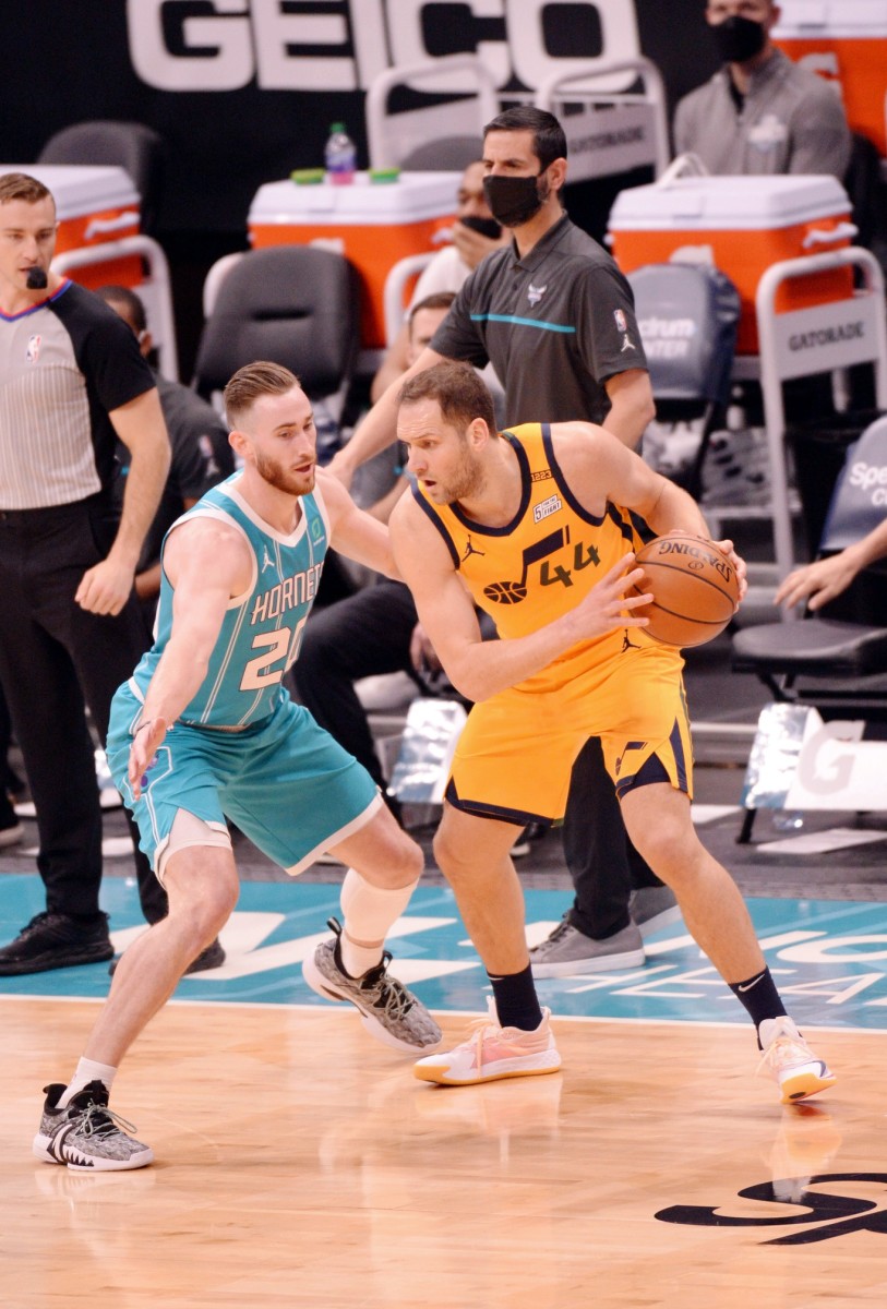 Bojan Bogdanovic (44) takes on Gordon Hayward (20) 